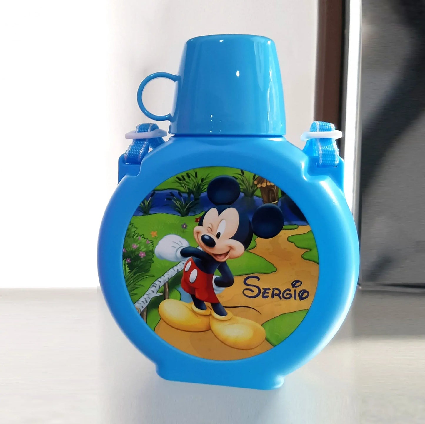 Cantimplora infantil con vaso